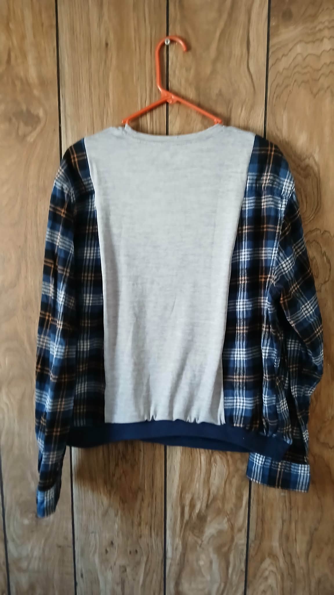 reworked adidas shirt with flannel sleeves